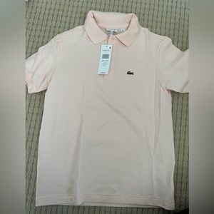 Lacoste Light pink size 14 sizing is on the smaller size.